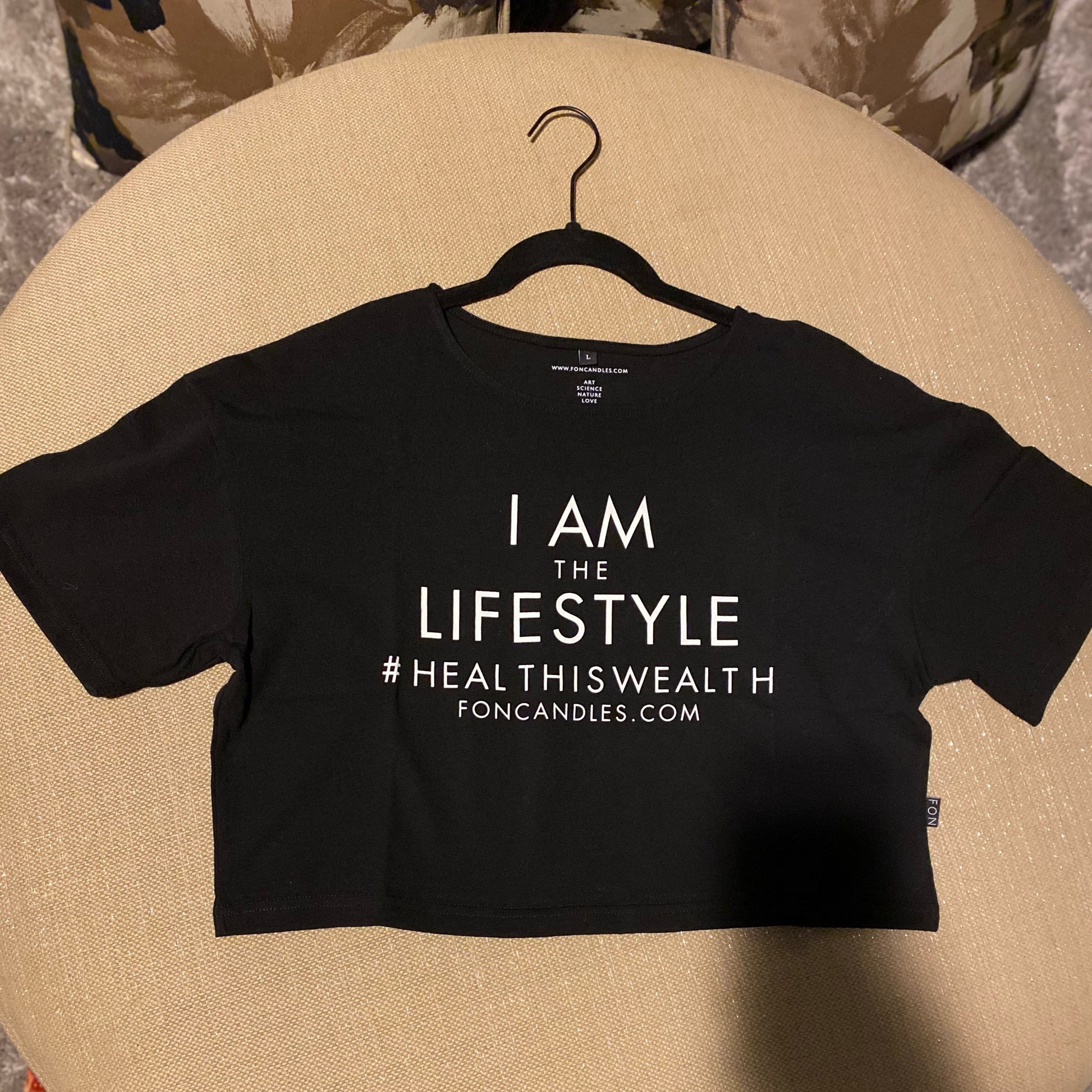 Black crop top with I Am the Lifestyle message #healthiswealth foncandles.com